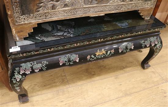 A Chinese lacquered coffee table, W.104cm